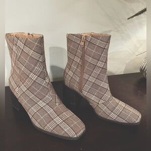 Brown and beige plaid ankle boots.